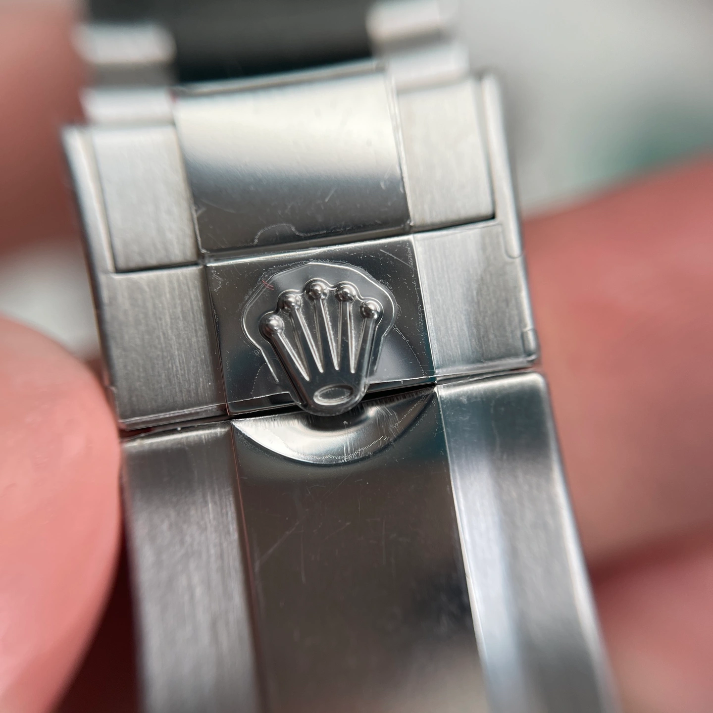 Close-up of a stainless steel clasp with brushed and polished finishing