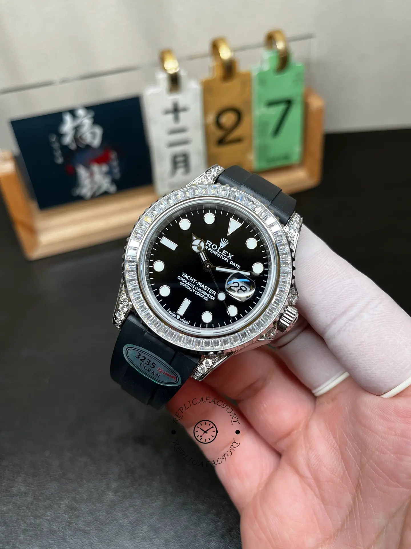 Front angled view of Rolex Yacht-Master 42 226679TBR with black dial, baguette bezel and diamond-set lugs.