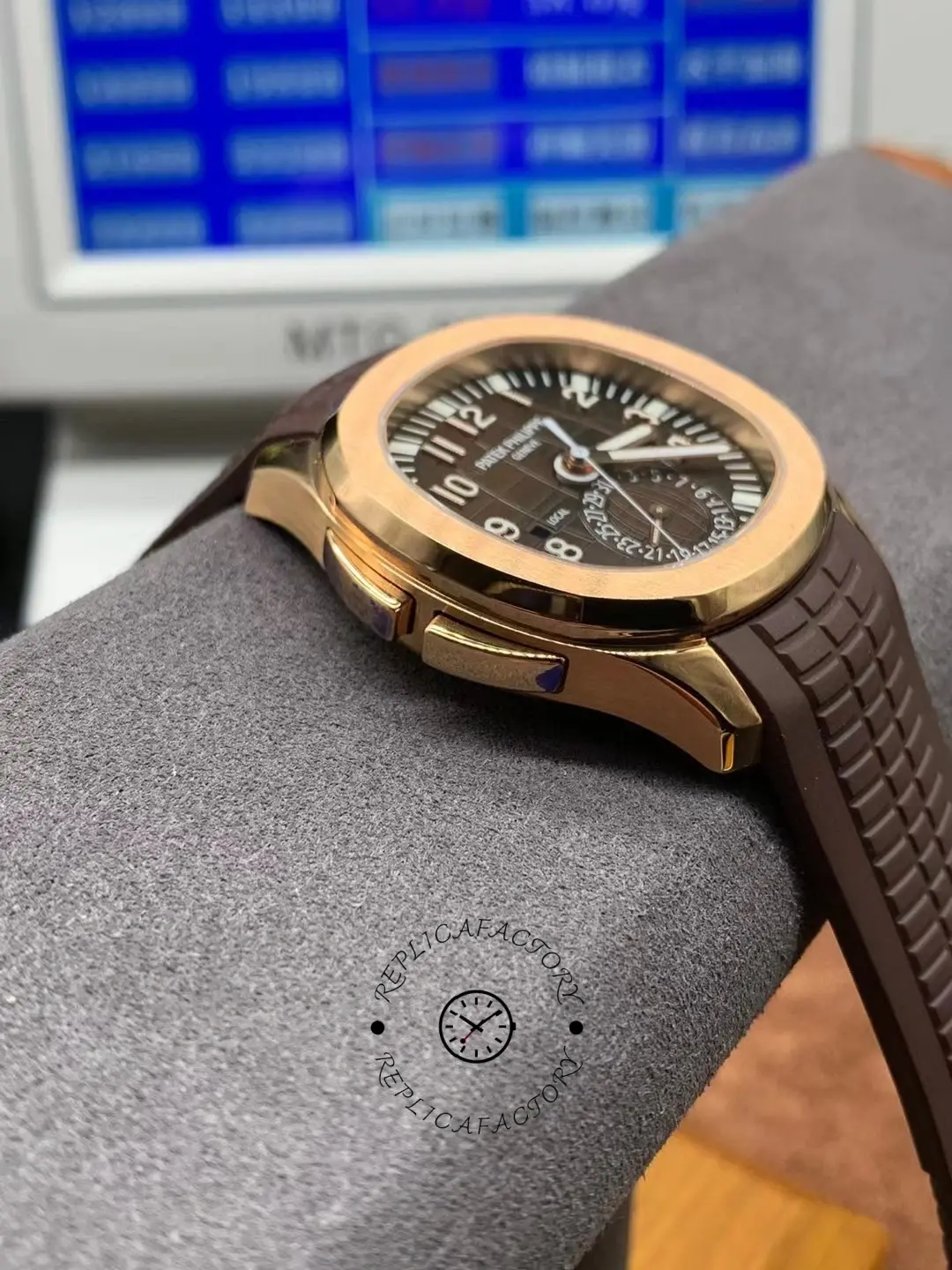 Side angle of the Patek Philippe Aquanaut 5164R-001 showing bezel height and case curvature.