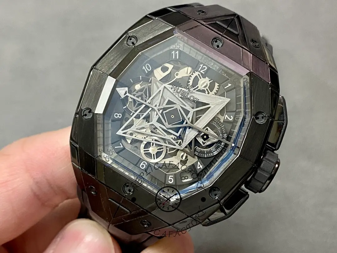 Close angled dial shot of Hublot 648.CX.0114.RX.MXM23 showing layered skeleton depth and subdial details.
