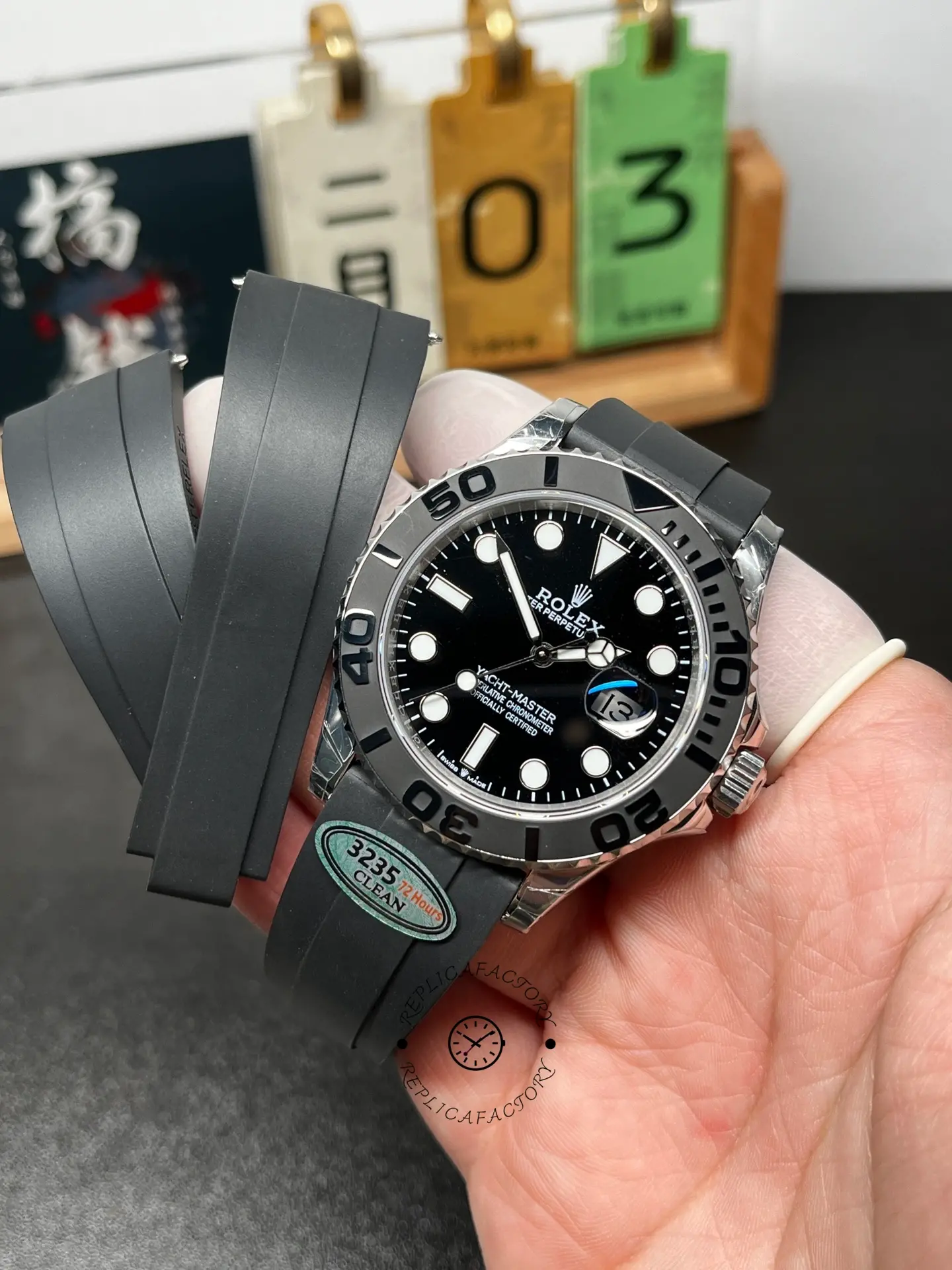 Full set shot of Rolex Yacht-Master 226659 with Oysterflex straps and watch head displayed in hand.