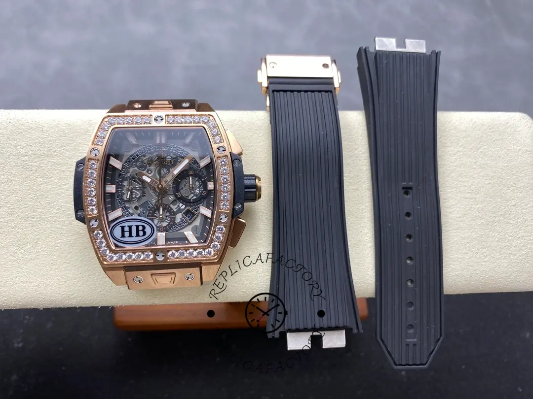 Watch head and detached strap pieces of Hublot 642.OX.0180.RX.1104 displayed side by side on a cushion.
