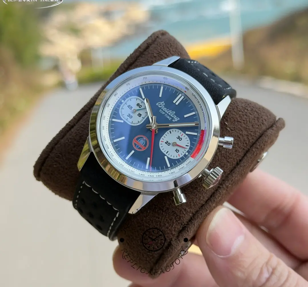 Breitling Top Time B01 Shelby Cobra AB01763A1C1X1, cushion shot showing dial layout and strap texture.