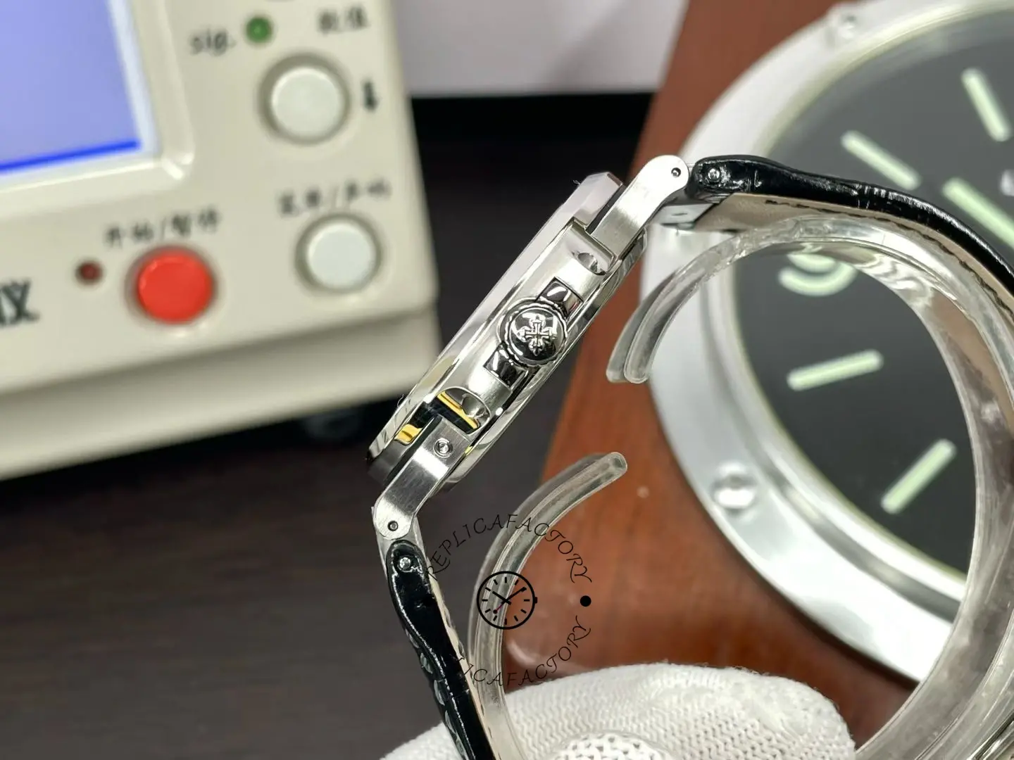 Side view of Patek Philippe Nautilus 5724G 001 showing white gold case profile and signed crown.