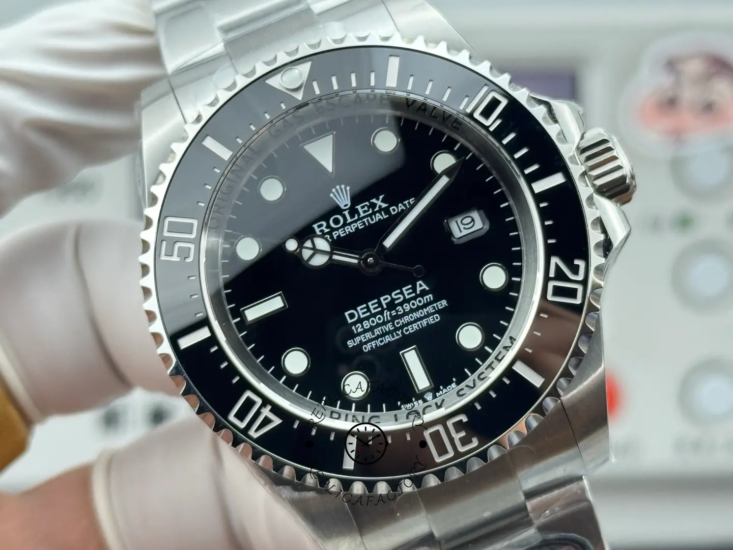 Angled dial shot of Rolex Sea-Dweller 126600 highlighting the bezel scale and Deepsea dial text.