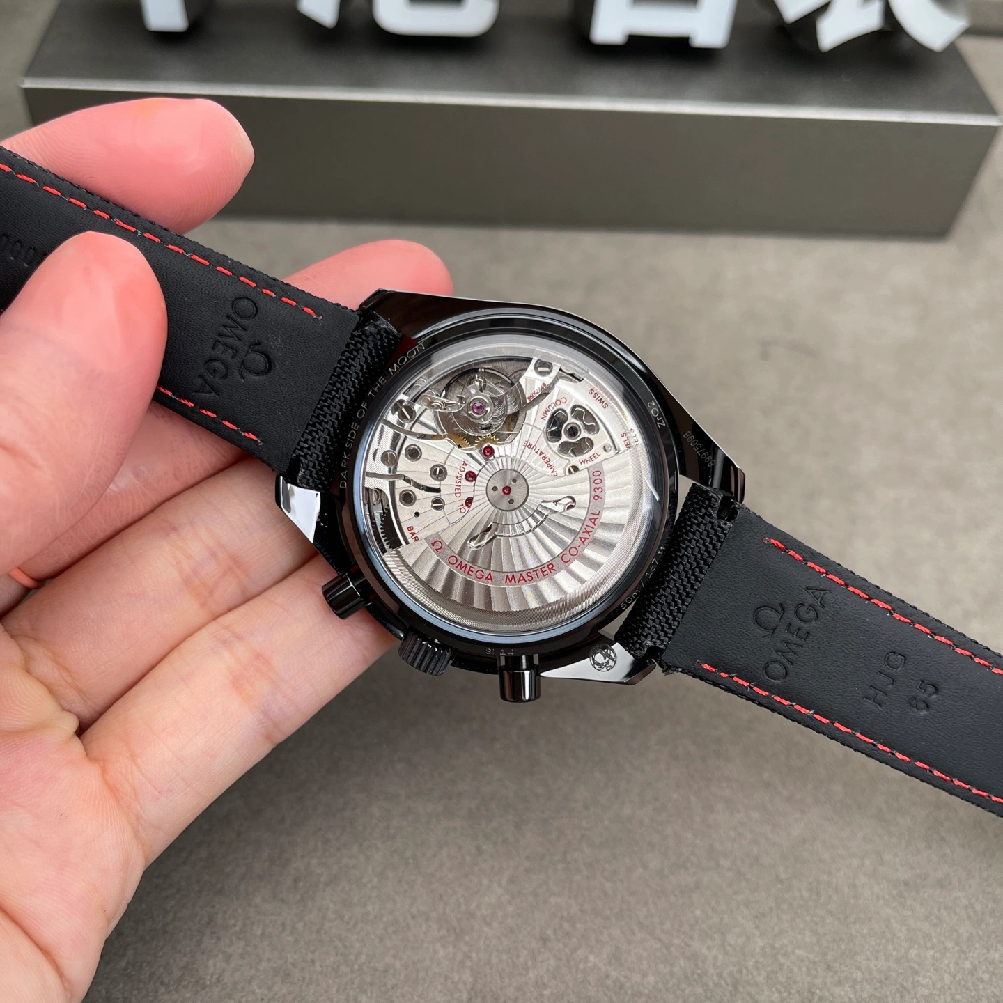 Back view of a watch showing ceramic case construction