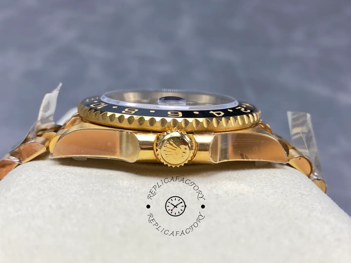 Rolex GMT-Master II crown side yellow gold screw down crown