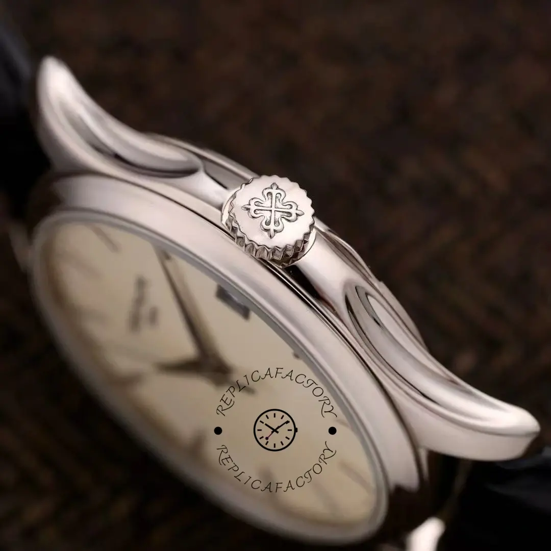 Side profile of the Patek Philippe Calatrava 5227G-001 showing the case thickness and signed crown.