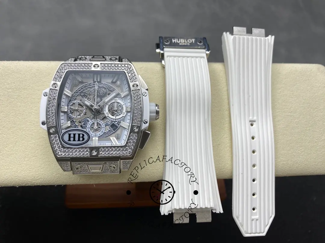 Hublot 642.NE.2010.RW.1604 watch head with two white ribbed rubber strap pieces displayed as a set.