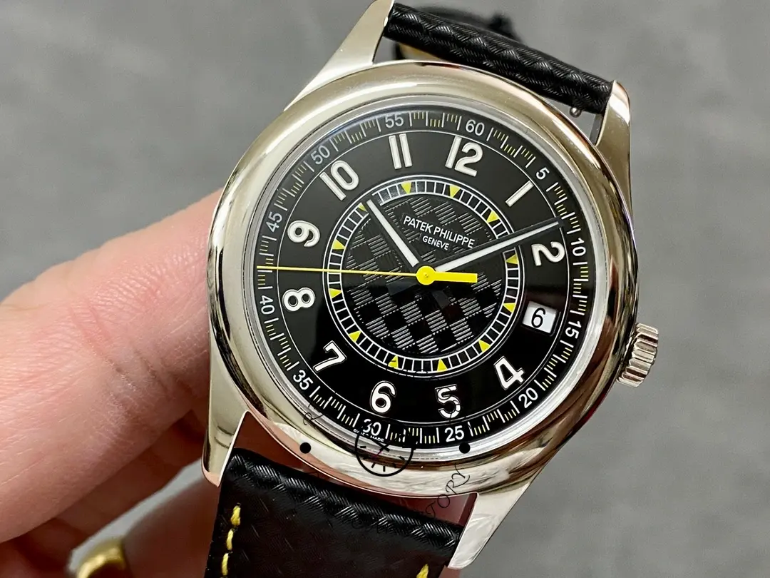 Dial close-up of the Patek Philippe Calatrava 6007G-001, with yellow seconds track and luminous hands.