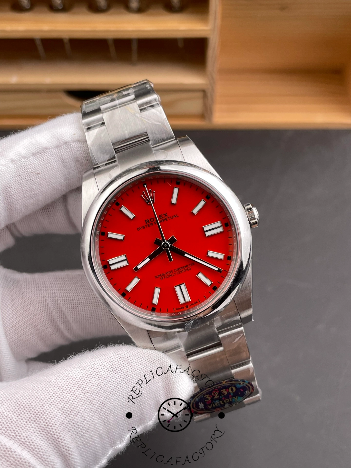 Rolex Oyster Perpetual 41 124300 0007 Red Dial