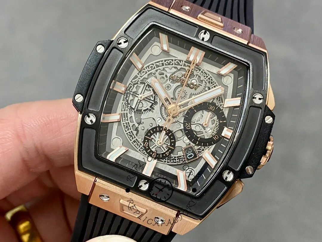 Close-up of Hublot 642.OM.0180.RX dial with rose gold-tone markers, chronograph registers, and skeleton movement layers.