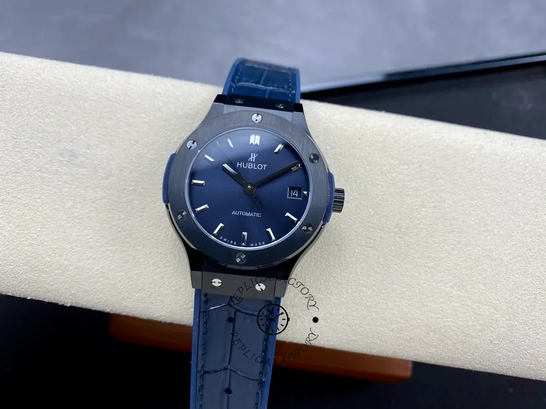 Dark blue/black Hublot Classic Fusion 511.CO.1181.RX on cushion, full view with matching strap.