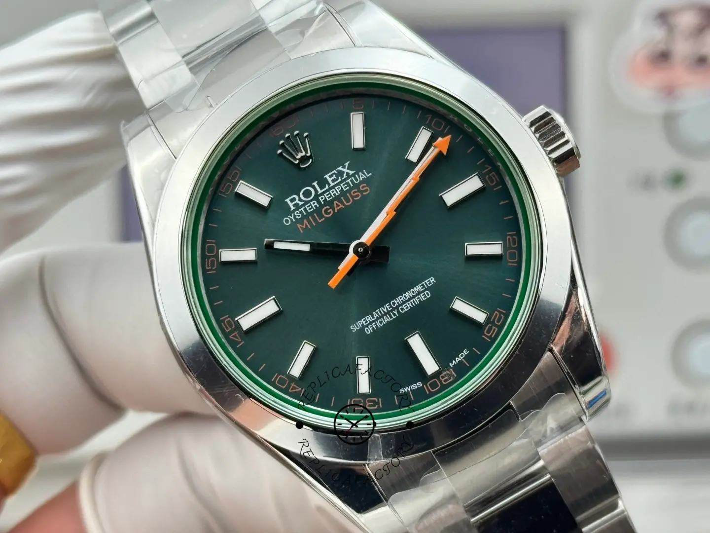 Close-up of Rolex Milgauss 116400GV-0002 showing Z-blue dial, white markers and orange lightning hand.