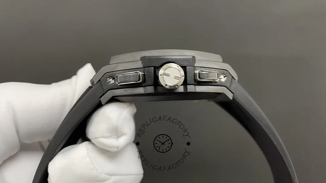 Crown-side close-up of Hublot 642.CI.0170.RX showing signed crown and protective guards.