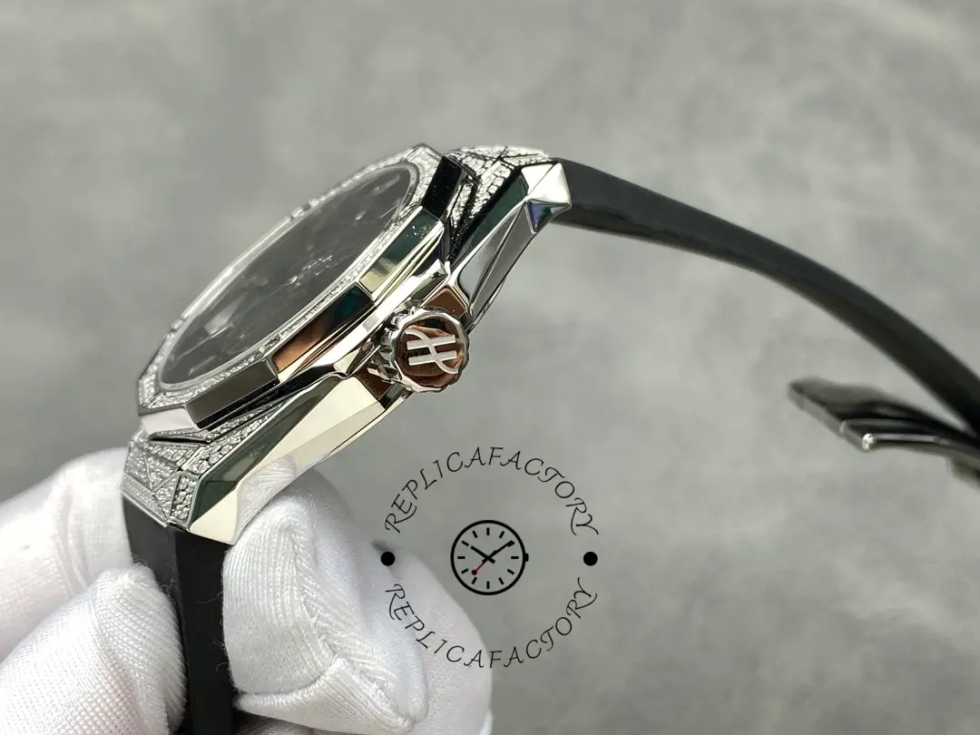 Crown-side view of Hublot Classic Fusion 550.NS.1800.RX.1604.ORL19 showing the engraved logo crown and faceted case.