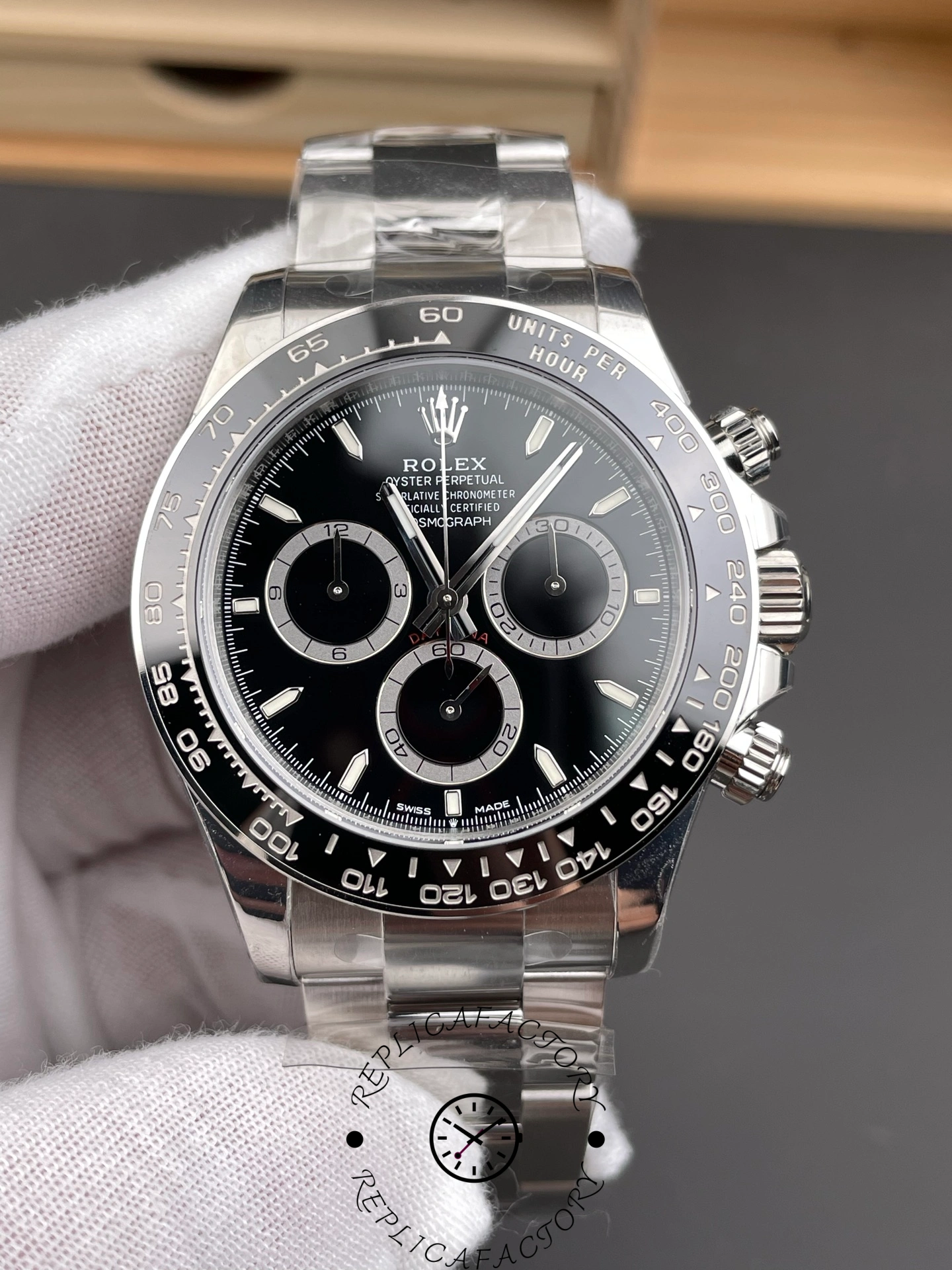 Close front view of Rolex Cosmograph Daytona m126500LN-0002 with black dial and Oystersteel case.
