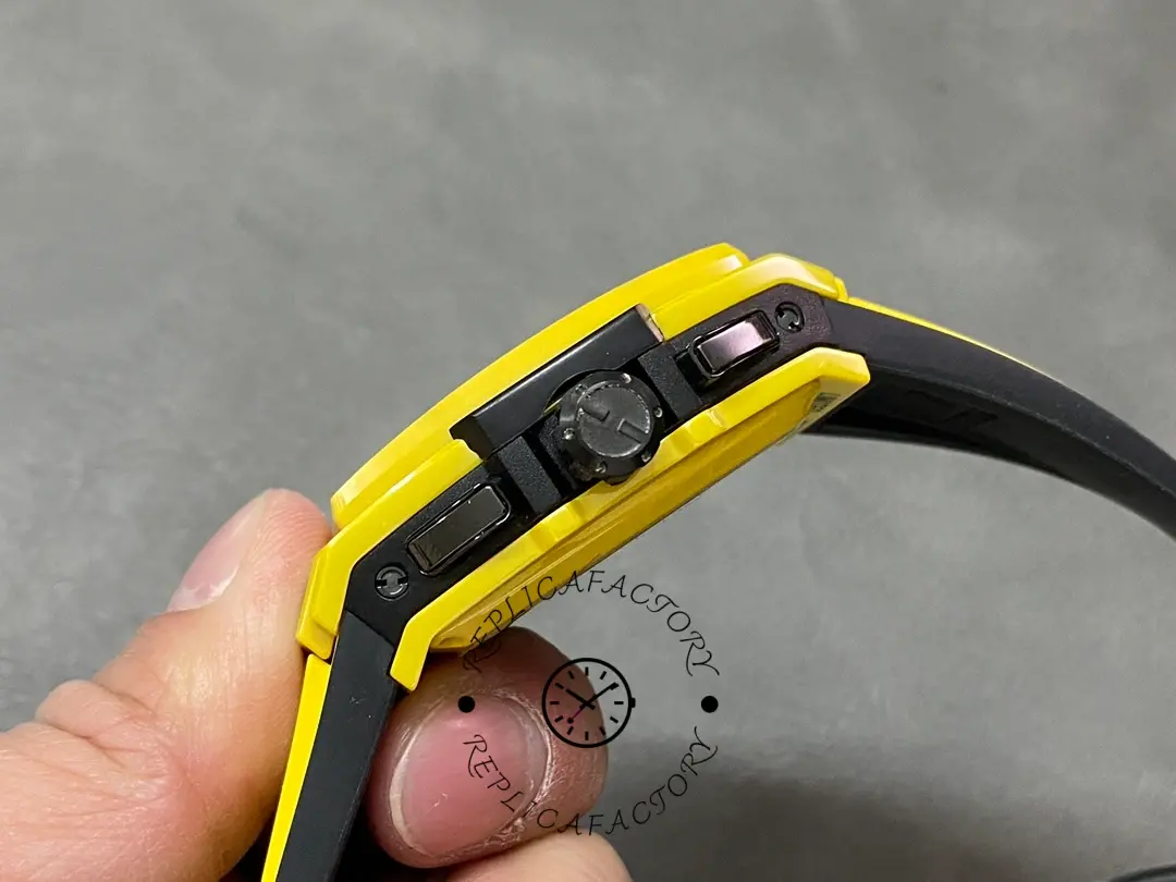 Side angle of Hublot 642.CY.011Y.RX showing crown guards and pusher-style controls.