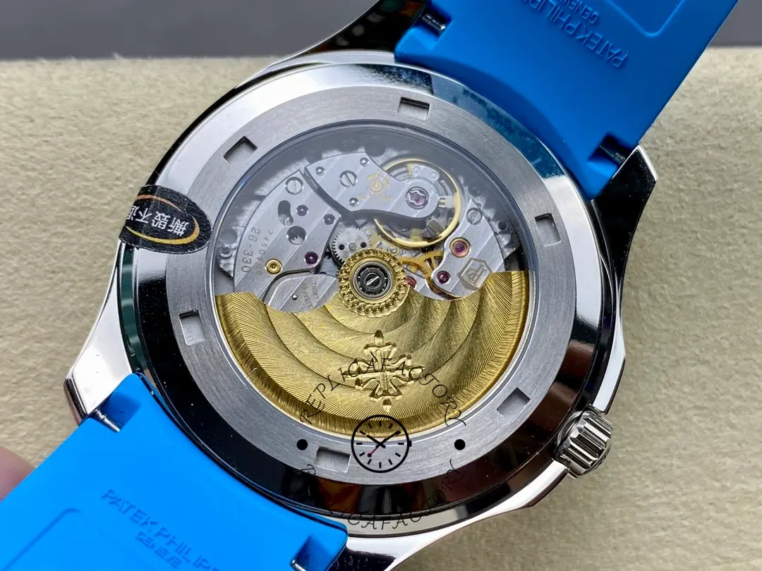 Exhibition caseback of Patek Philippe Aquanaut 5167A-001 showing gold rotor and movement details.