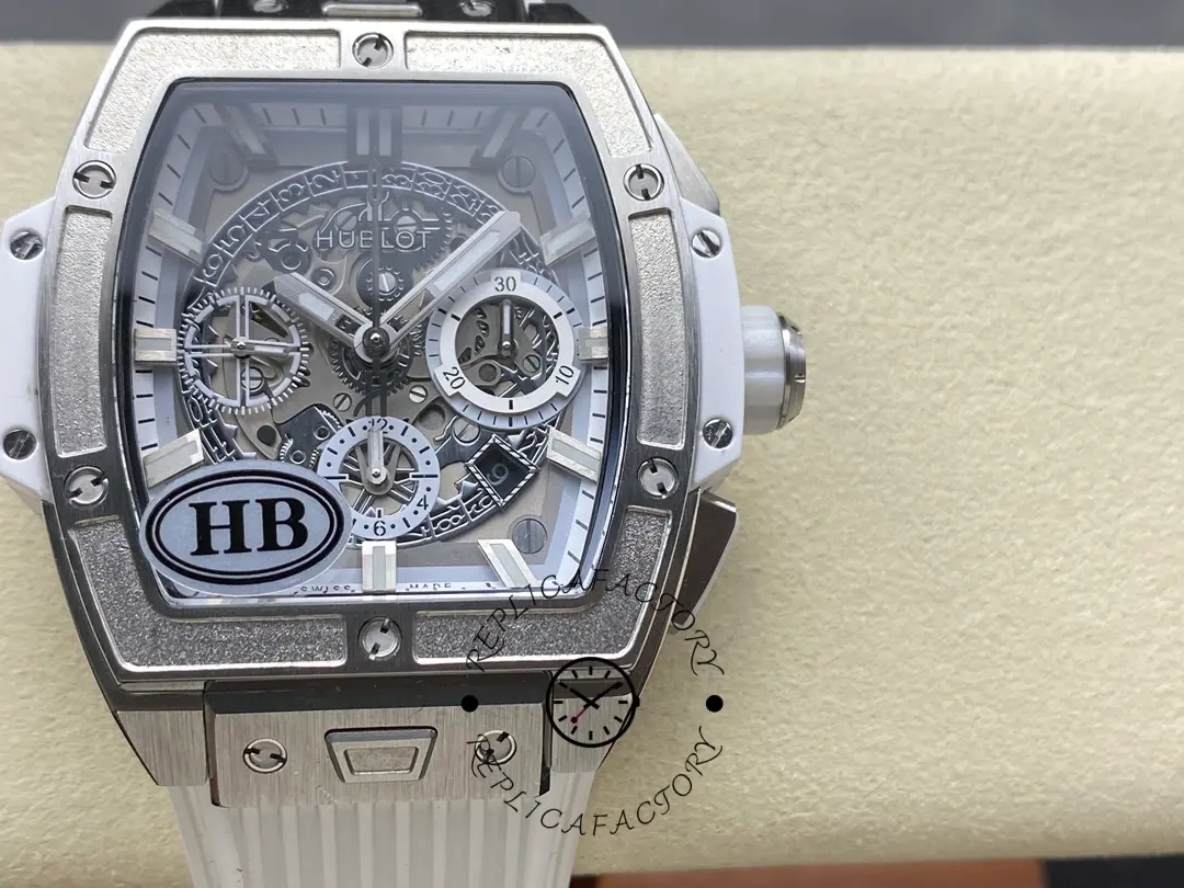 Straight-on close-up of Hublot 642.NE.2010.RW on display cushion showing the dial and bezel stones.