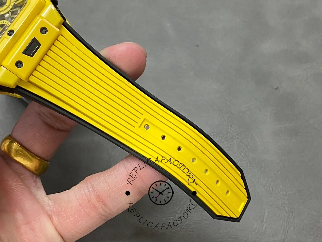 Strap detail of Hublot 642.CY.011Y.RX showing ribbed yellow rubber texture and finishing.