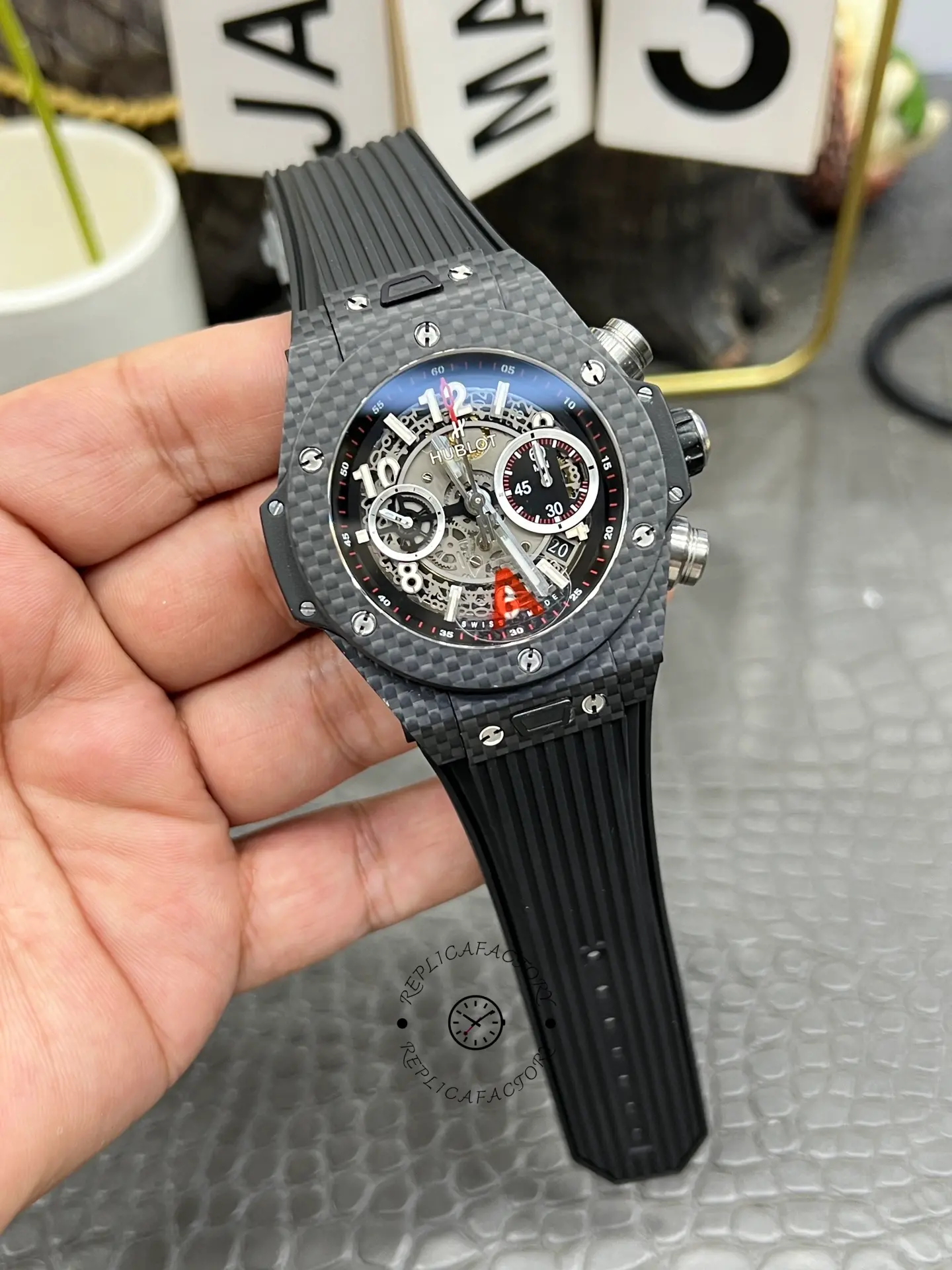 Hublot Big Bang UNICO 411.QX.1170.RX dial view, openworked movement details and markers.