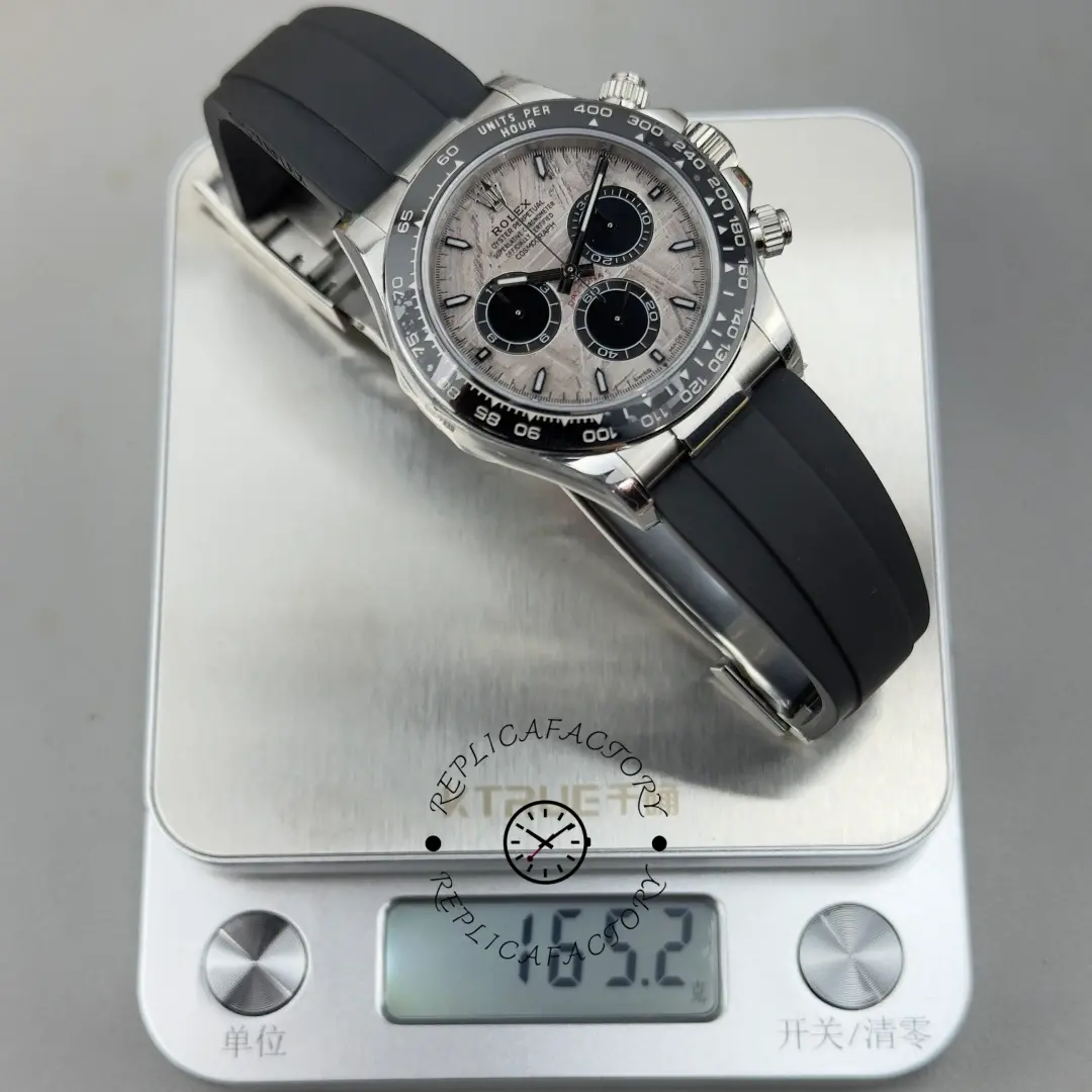 Rolex Daytona 116519 on scale showing meteorite dial, black ceramic bezel, and Oysterflex strap.