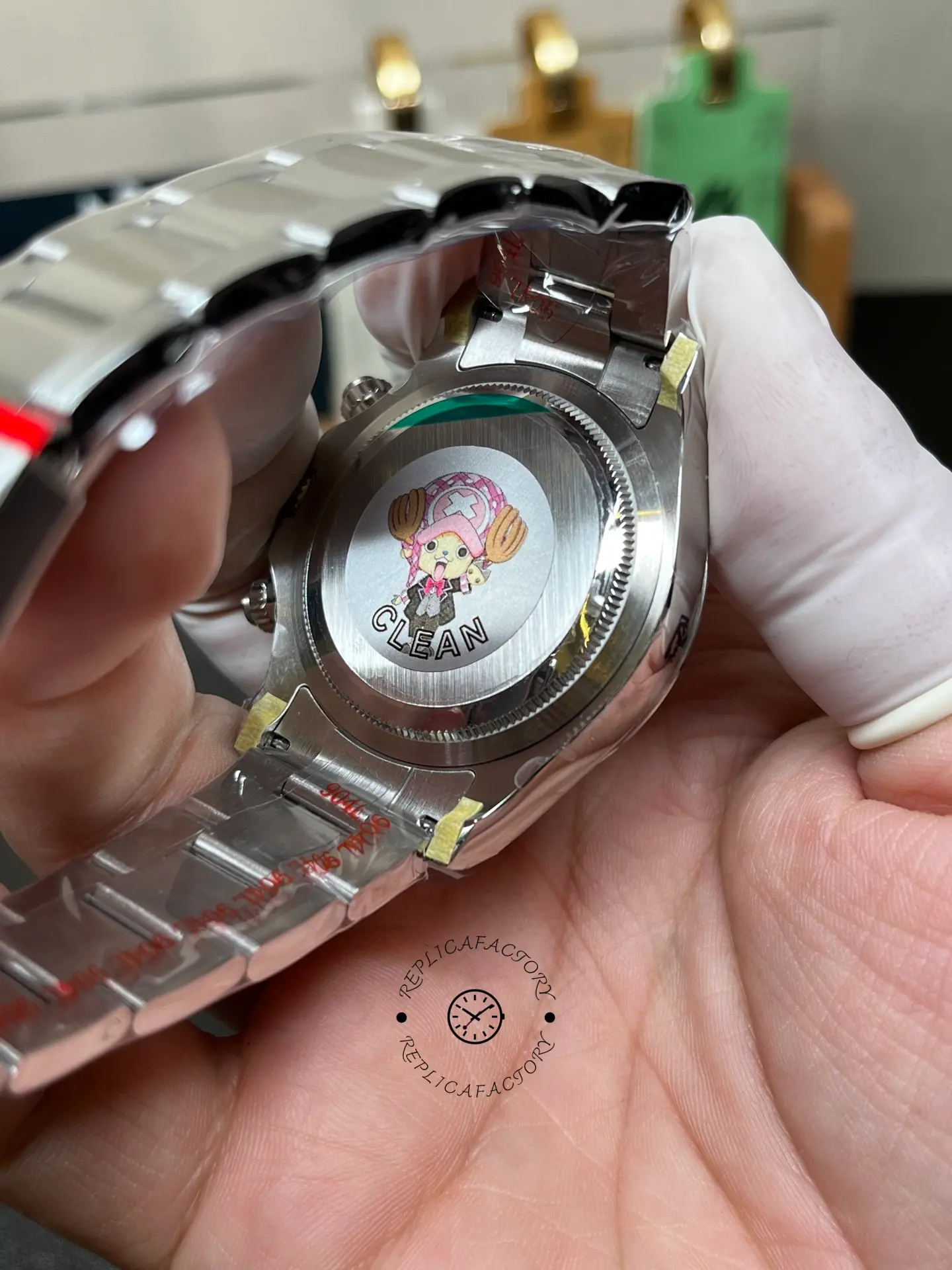 Back view of Rolex Cosmograph Daytona M126500LN-0001 showing the solid case back and inner Oyster bracelet.