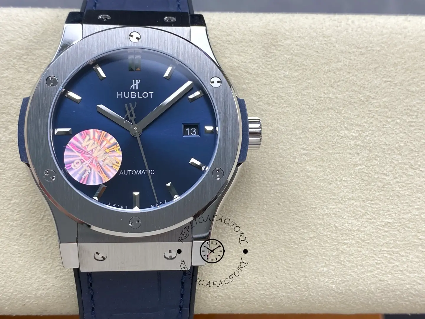 Straight-on view of Hublot Classic Fusion 542.NX.7170.LR highlighting bezel screws and blue dial.