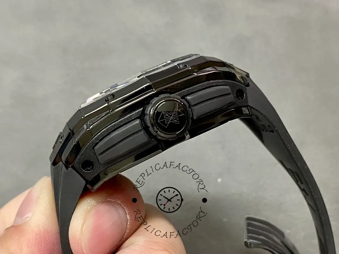 Crown-side view of Hublot 648.CX.0114.RX.MXM23 showing emblem crown and protective side guards.