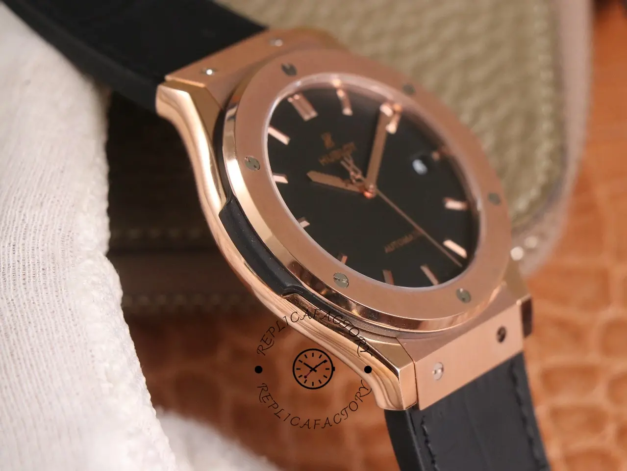 Angle shot of Hublot Classic Fusion 542.OX.1181.LR showing the domed crystal and bezel screws.