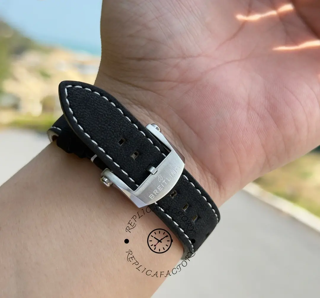 Breitling Top Time B01 Shelby Cobra AB01763A1C1X1, wrist shot focusing on black strap and stitching.