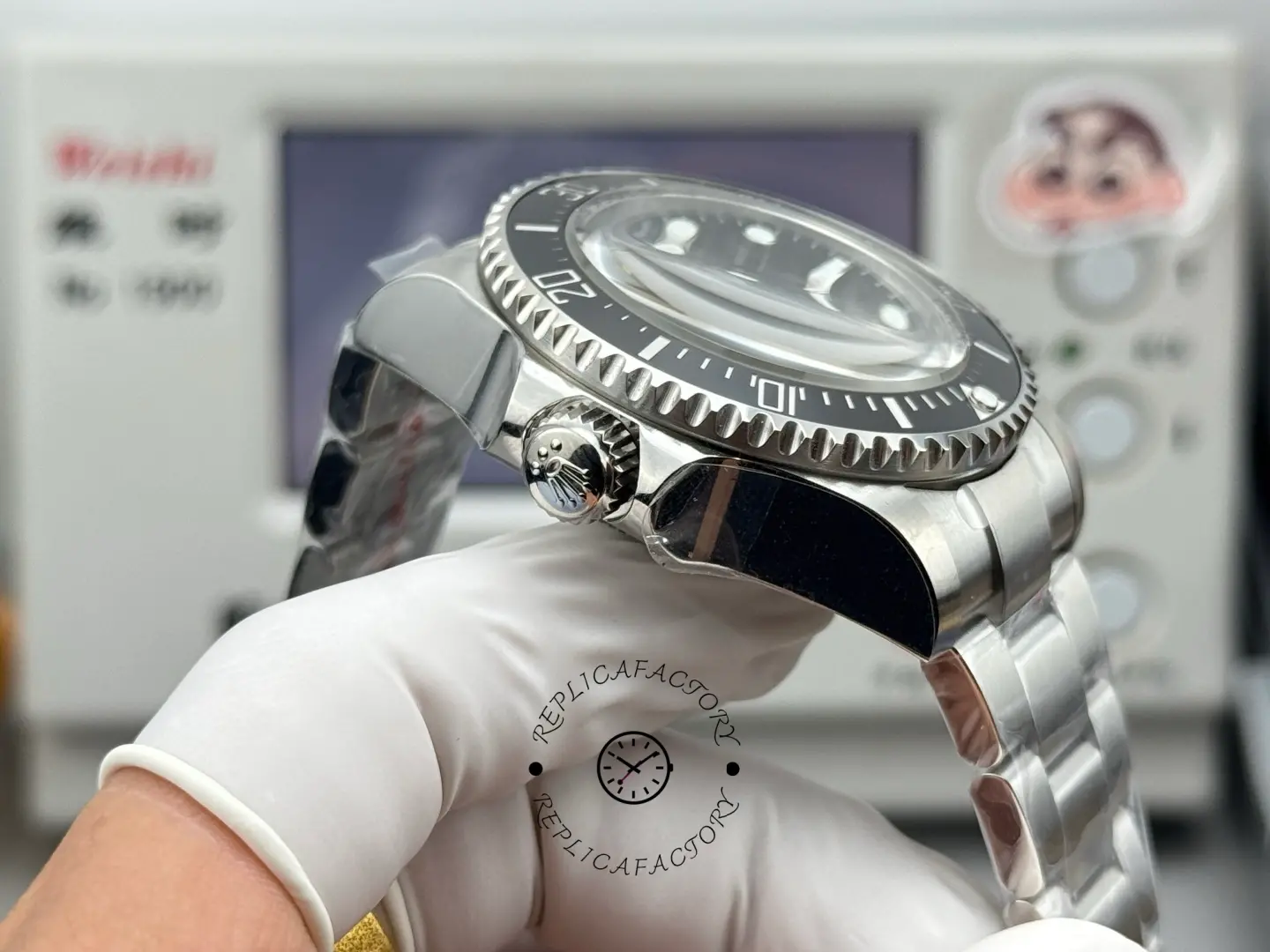 Crown-side view of Rolex Sea-Dweller 126600 showing screw-down crown and polished case flank.