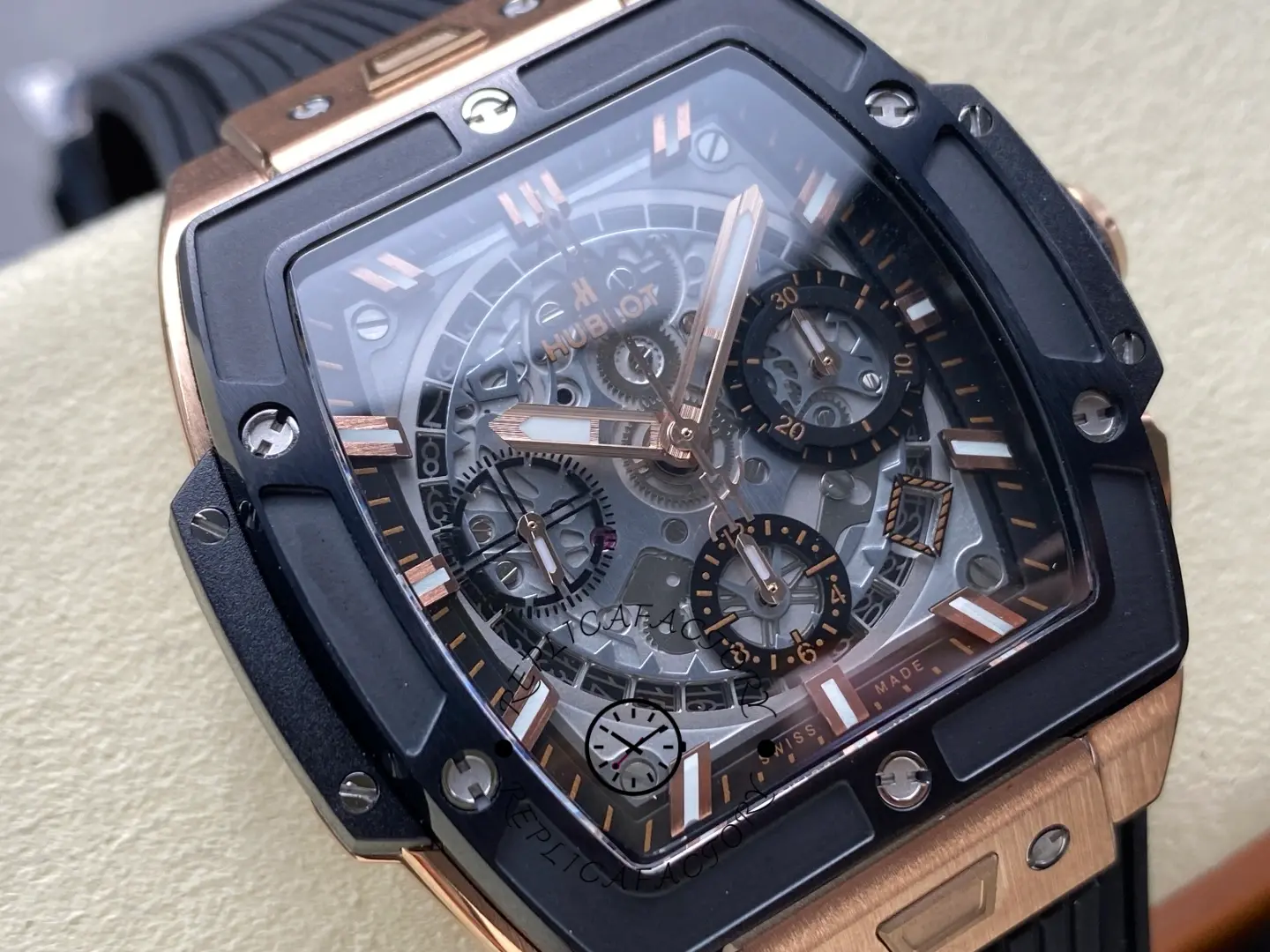 Angled wrist-rest view of Hublot 642.OM.0180.RX highlighting rose gold-tone case edges and bezel screws.