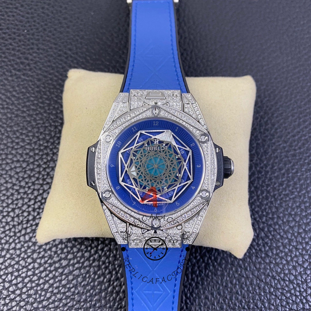 Hublot Big Bang Sang Bleu 415.NX.7179.VR.1704.MXM18 dial on cushion, straight-on view with blue strap.