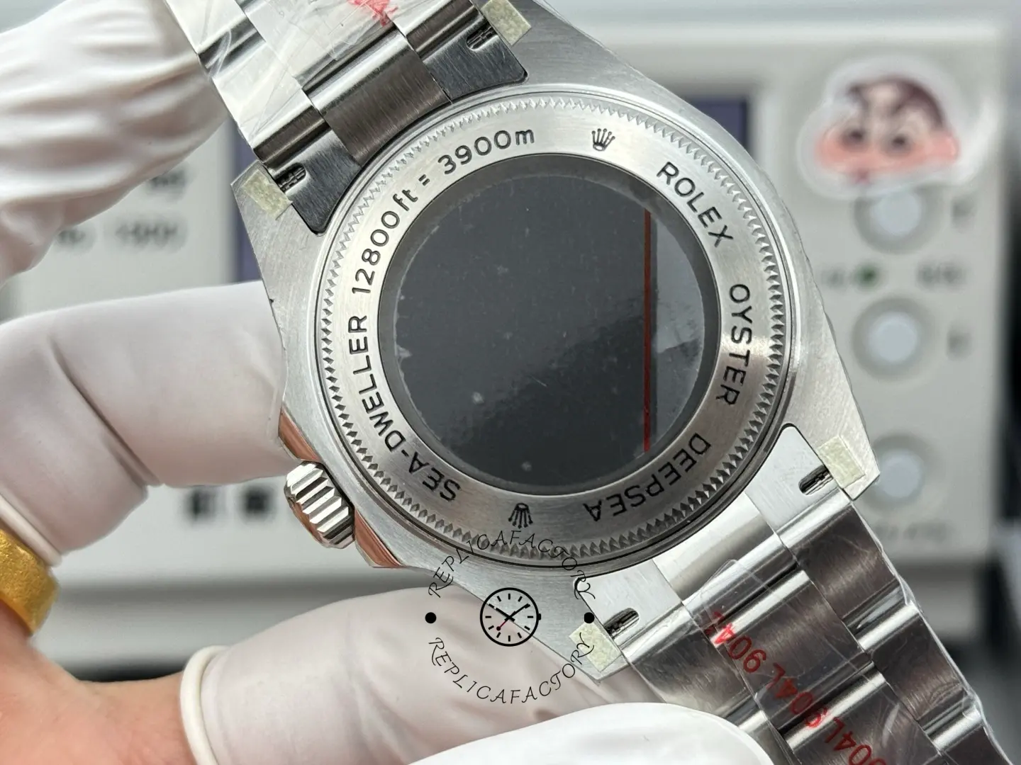 Caseback view of Rolex Sea-Dweller 126600 showing Sea-Dweller ring engravings around the back.