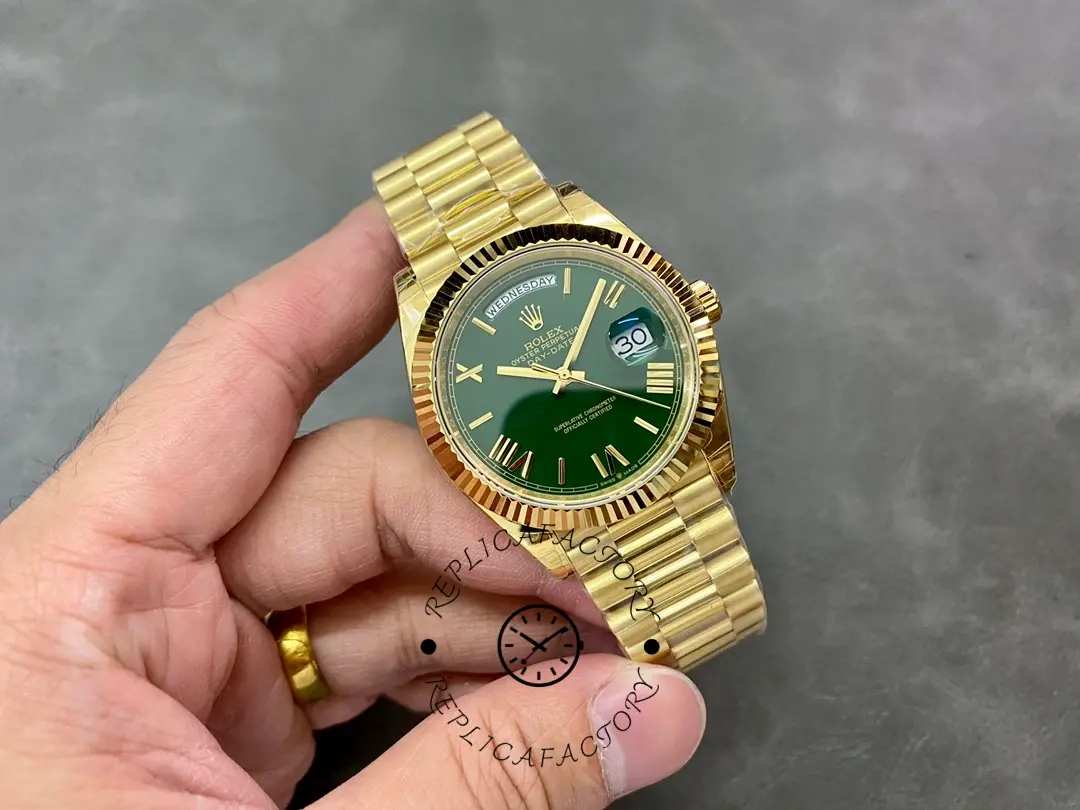 Handheld wrist-level view of Rolex 228238-0061 showing full watch and bracelet.