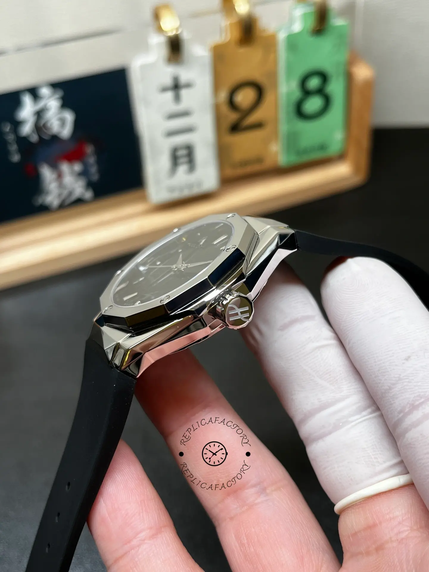 Hublot Classic Fusion Orlinski 550.NS.1800.RX.ORL19 case side close-up, crown and facets.