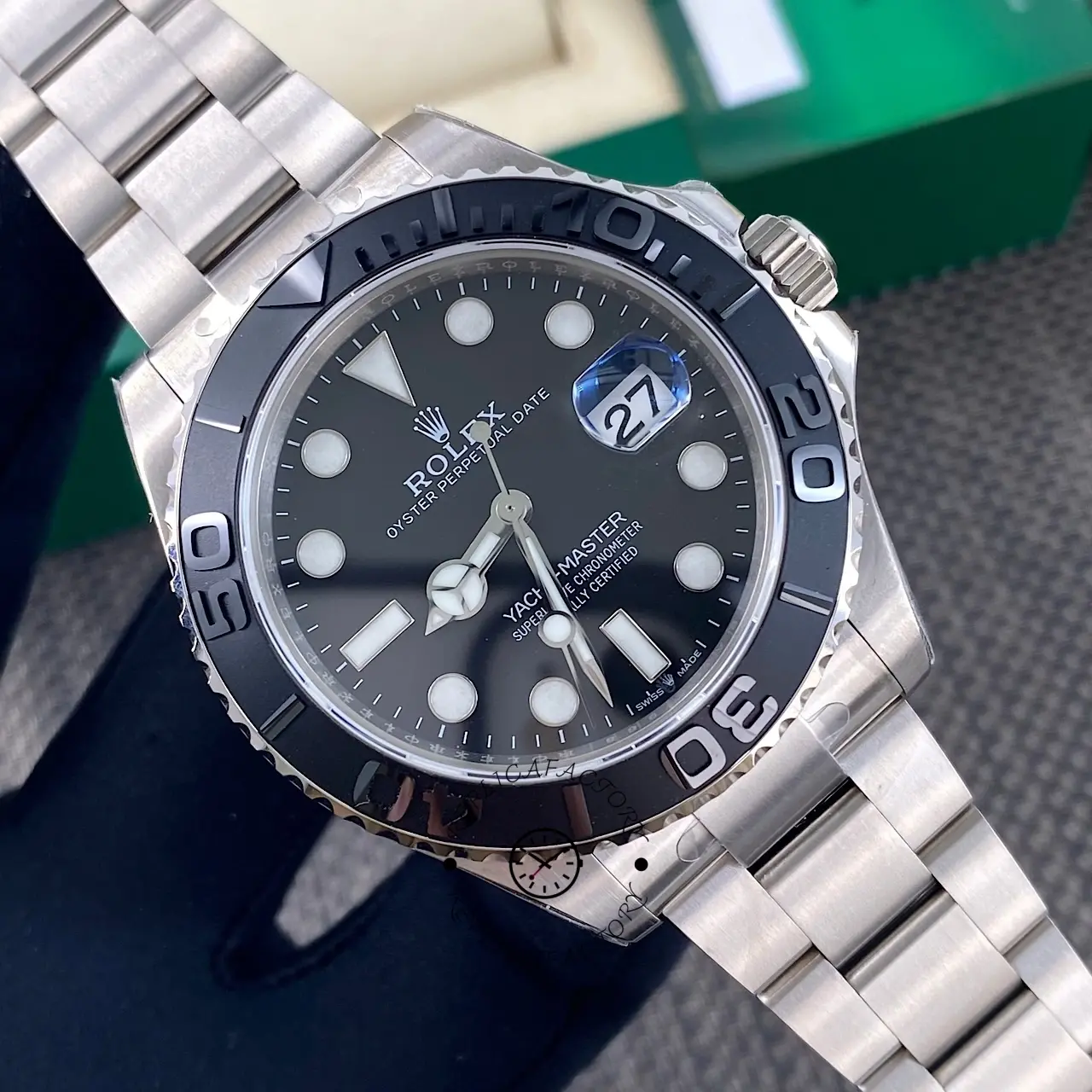 Front angle of Rolex Yacht-Master 226627-0001 highlighting black dial and brushed bracelet finish.