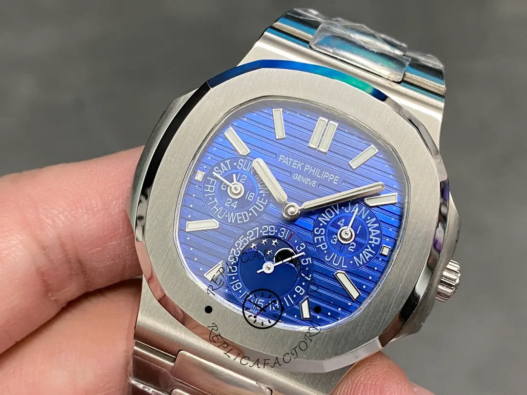 Macro shot of the Patek Philippe Nautilus 5740 1G 001 dial showing perpetual calendar subdials and markers.