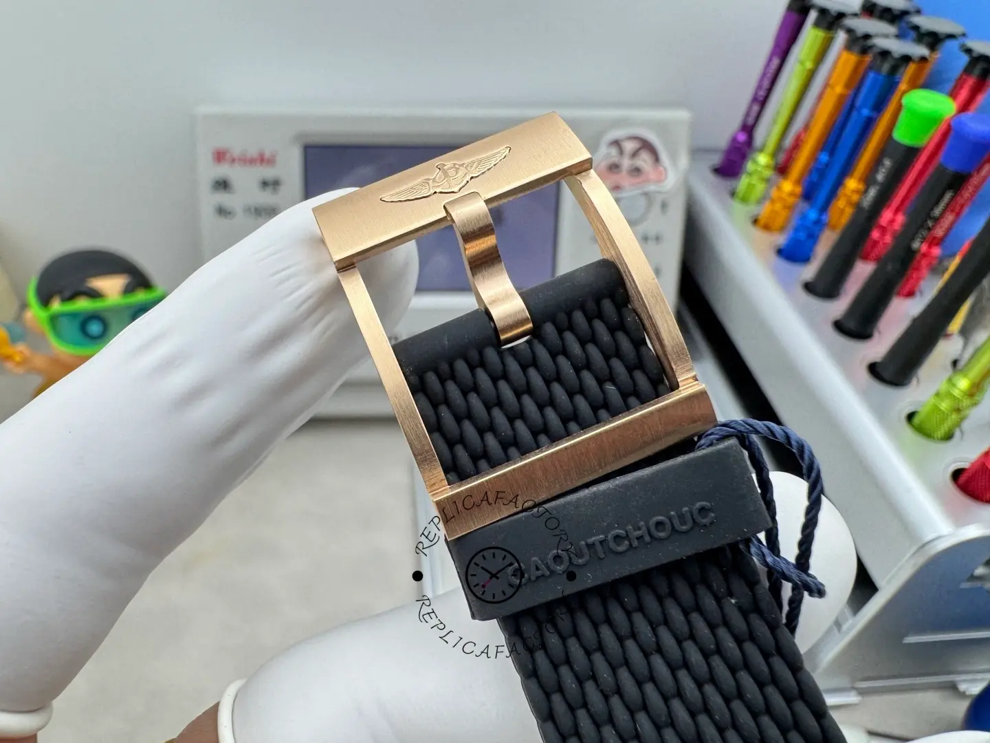 Breitling RB2010121B1S1, buckle and strap close-up showing rose-gold clasp hardware.