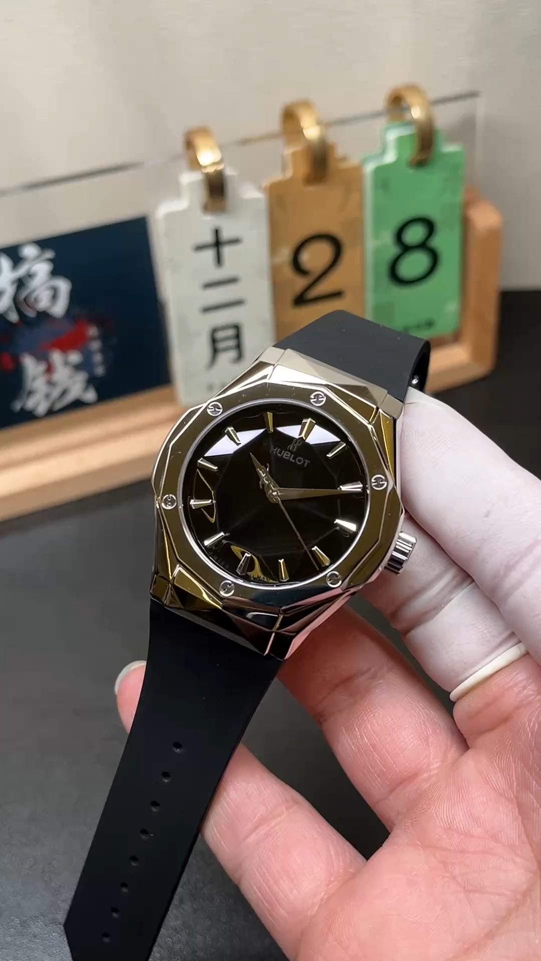 Hublot Classic Fusion Orlinski 550.NS.1800.RX.ORL19 strap-in-hand view, black rubber strap and case profile. - Video