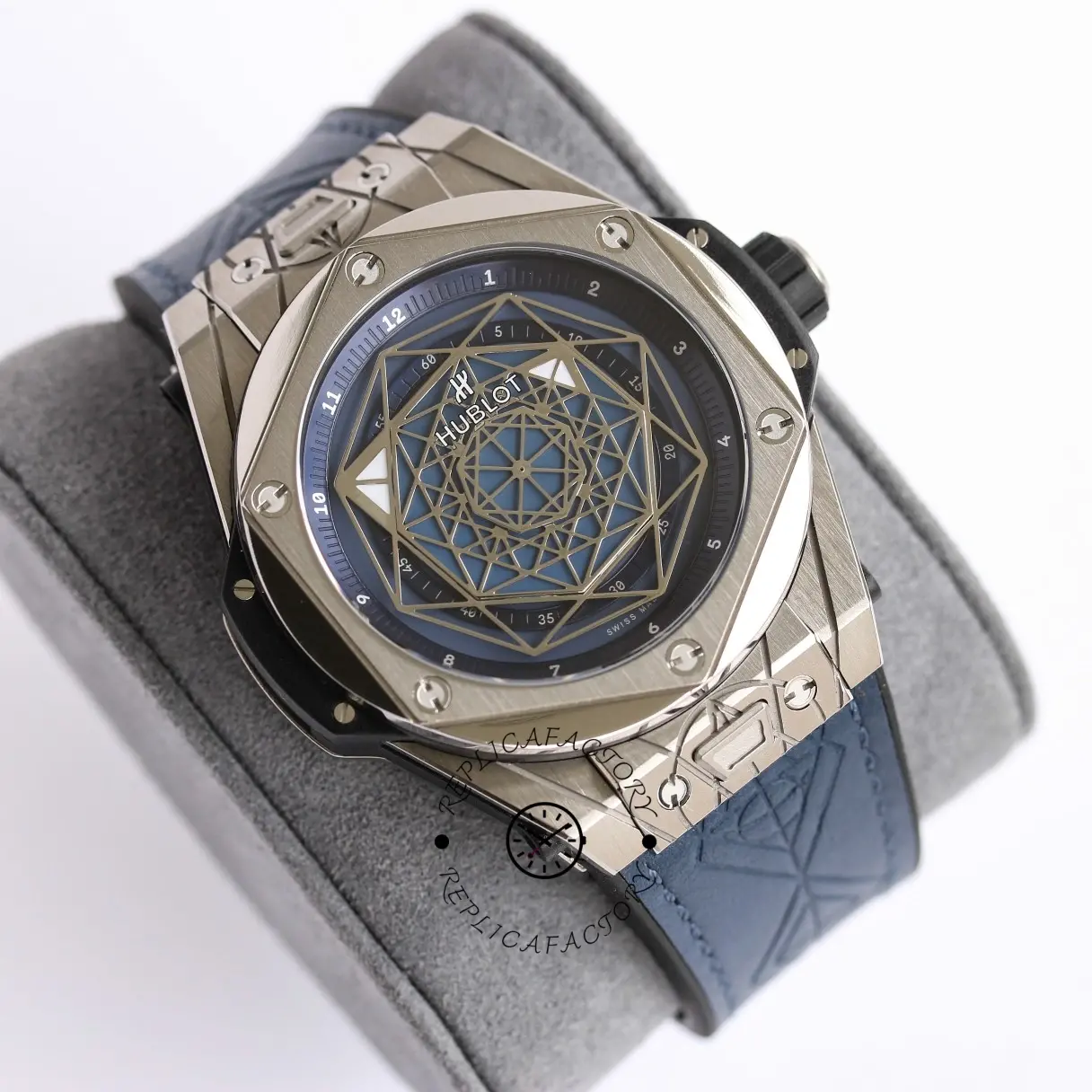 Angled shot of Hublot Big Bang 415.NX.1112.VR.MXM16 blue dial with case facets and bezel screws.