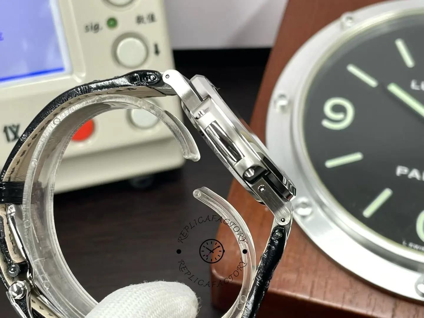 Angled side view of Patek Philippe Nautilus 5724G 001 highlighting slim case thickness.