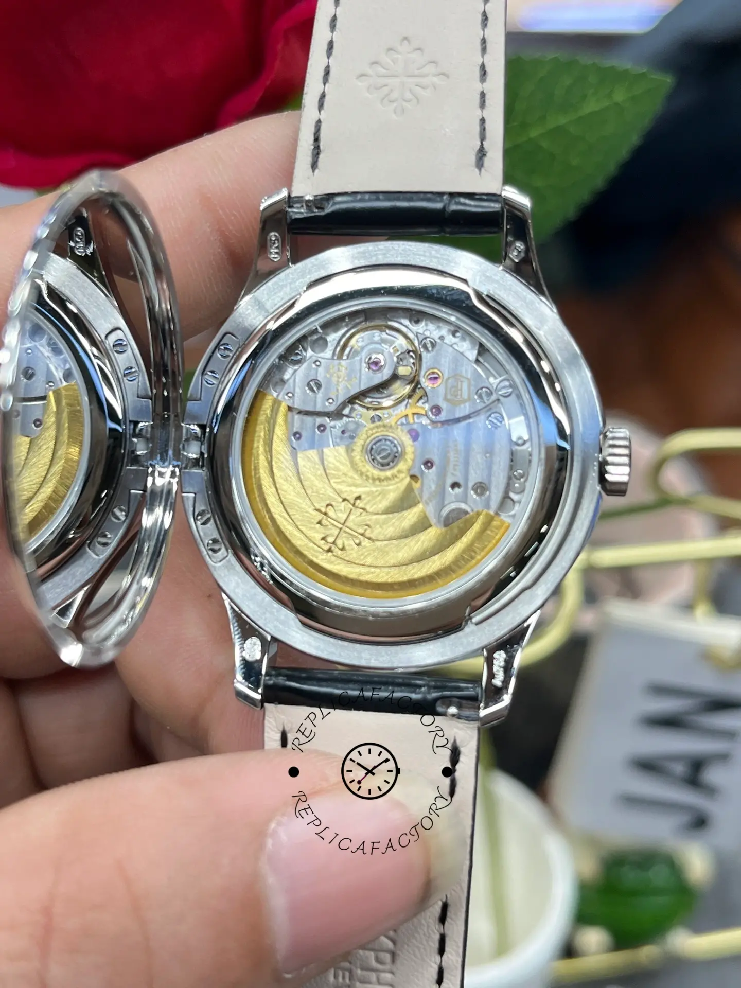 Exhibition caseback of the Patek Philippe Calatrava 5227G-001 showing the rotor and movement decoration.