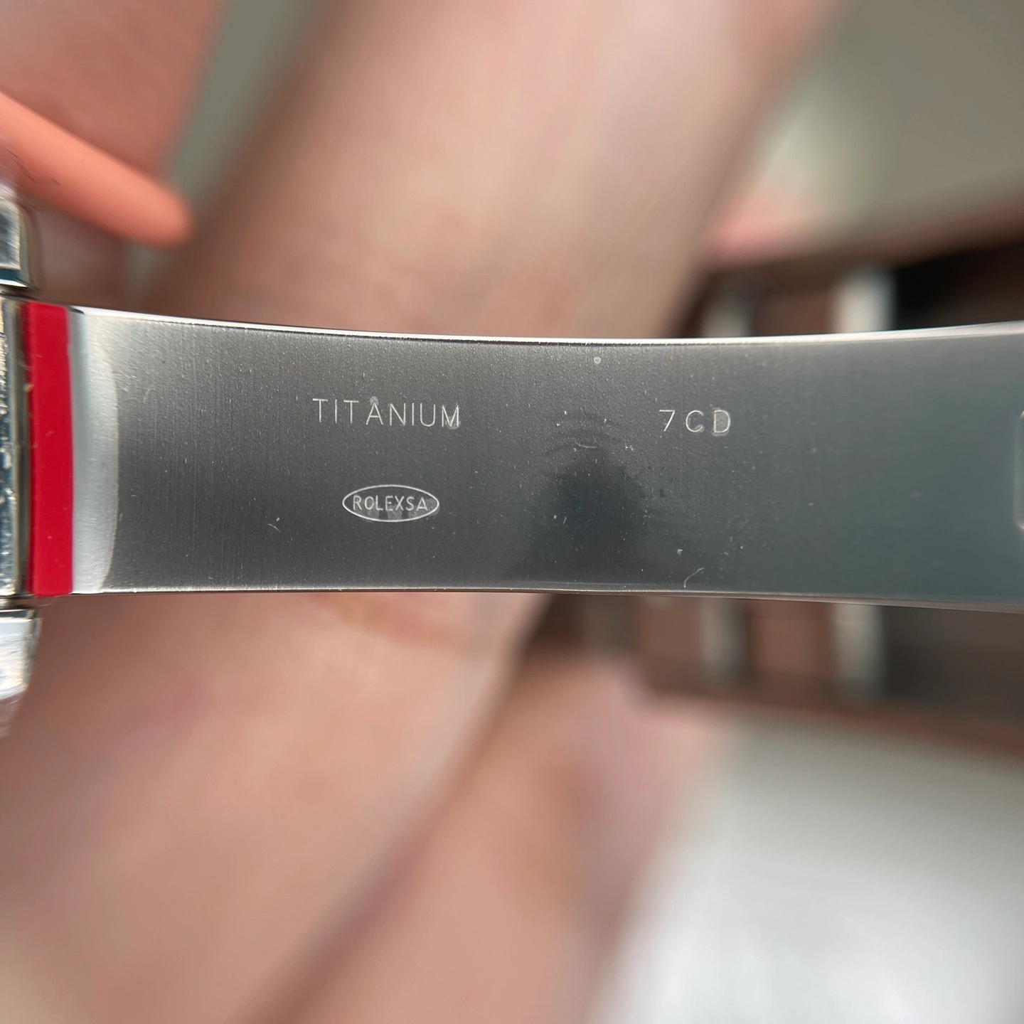 Titanium watch clasp with titanium engraving