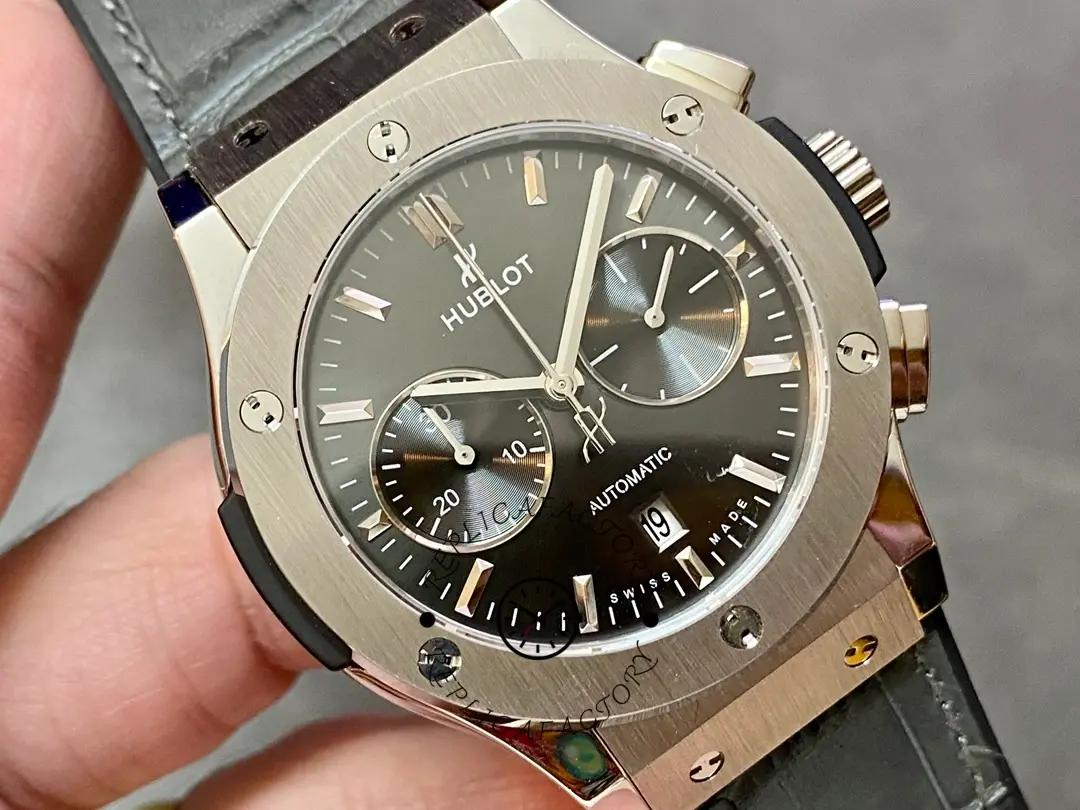 Close-up of Hublot 521.NX.7071.LR showing chronograph subdials and brushed bezel.