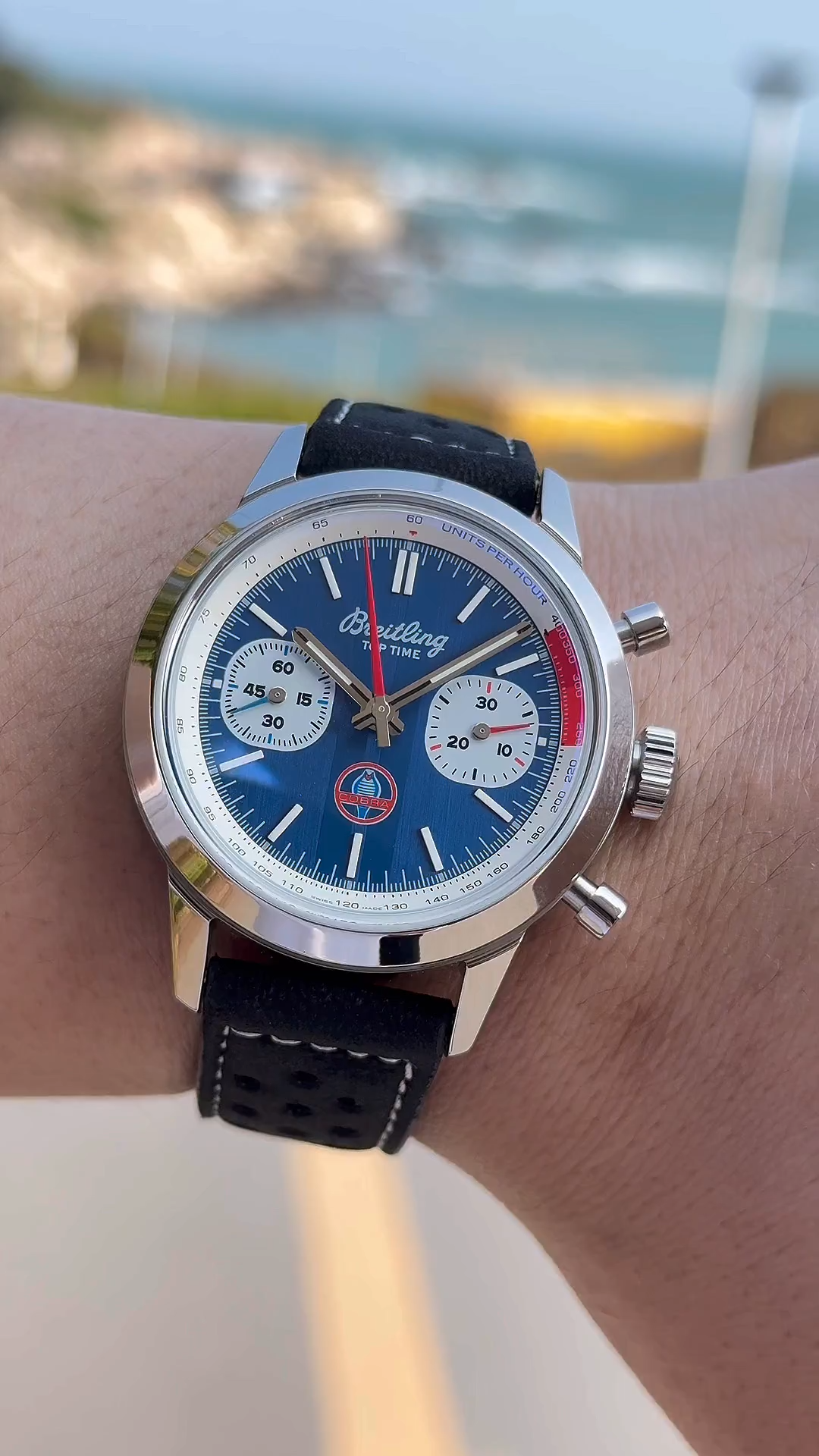 Breitling Top Time B01 Shelby Cobra AB01763A1C1X1, wrist video showing blue dial and black perforated strap. - Video