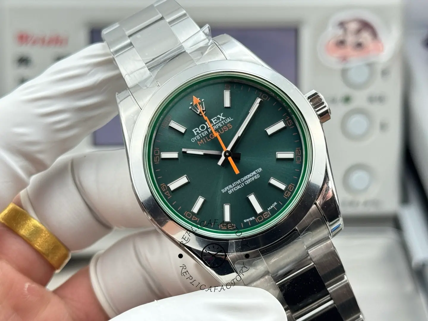 Angled front view of Rolex Milgauss 116400GV-0002 showing Z-blue dial and orange lightning seconds hand.