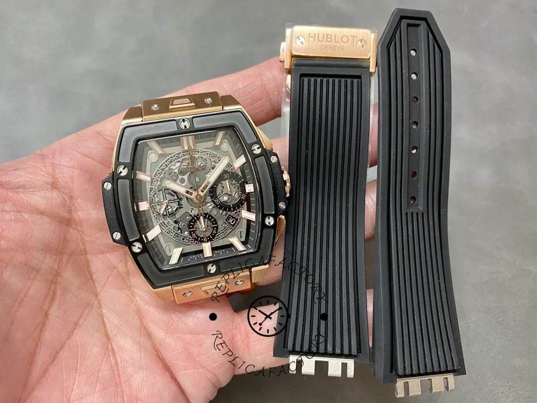 Set display of Hublot 642.OM.0180.RX with watch head and rubber strap pieces shown side by side.